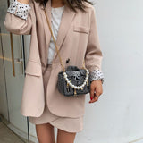 Clothes pearl handbag