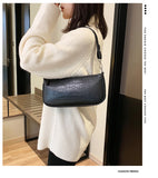 Stone pattern art handbag