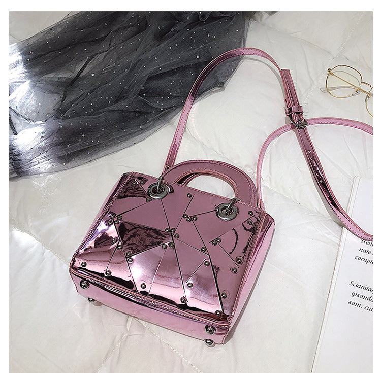 Face rivet stitching handbag