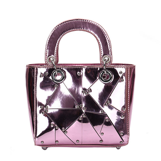 Face rivet stitching handbag